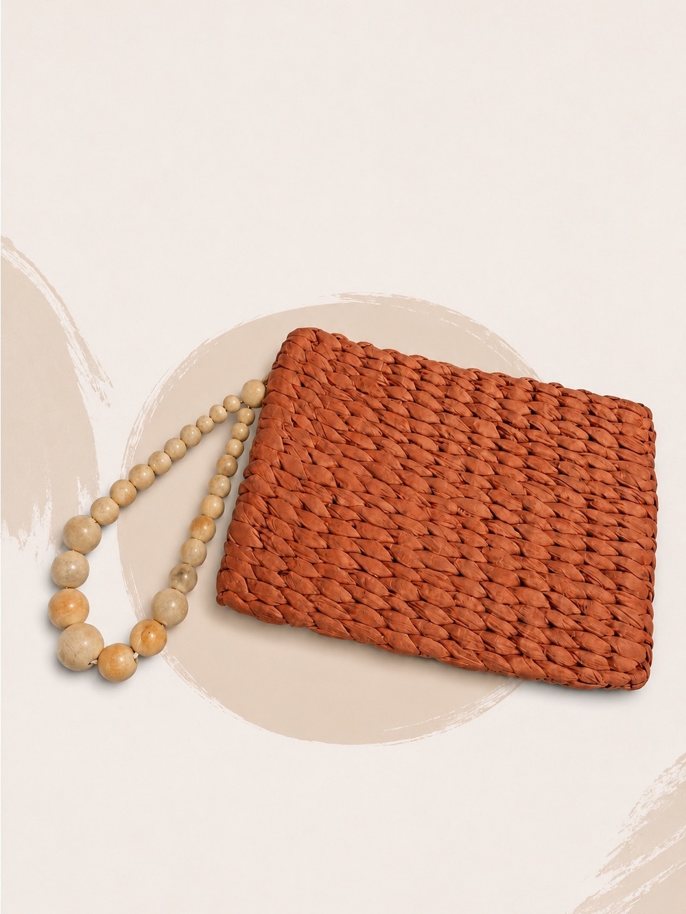 A NEW DAY SEAGRASS TERRA COTTA WITH BEIGE ROUND WOOD BEAD HANDLE
CLUTCH